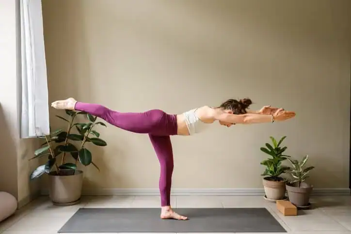 Achieving the Perfect Tone: How Often Should You Exercise for Results? 1 Woman doing Yoga exercise Virginia Water to help with toning the body.