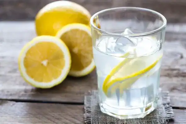 Hydration: The Secret Ingredient for a Toned Stomach and Enhanced Fitness 2 Image of lemon water to aid hydration Virginia Water